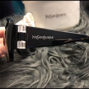 Women’s black YSL sunglasses